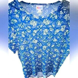 Lularoe XXS blue & white floral IRMA tunic top. NWT . Rose‎ pattern